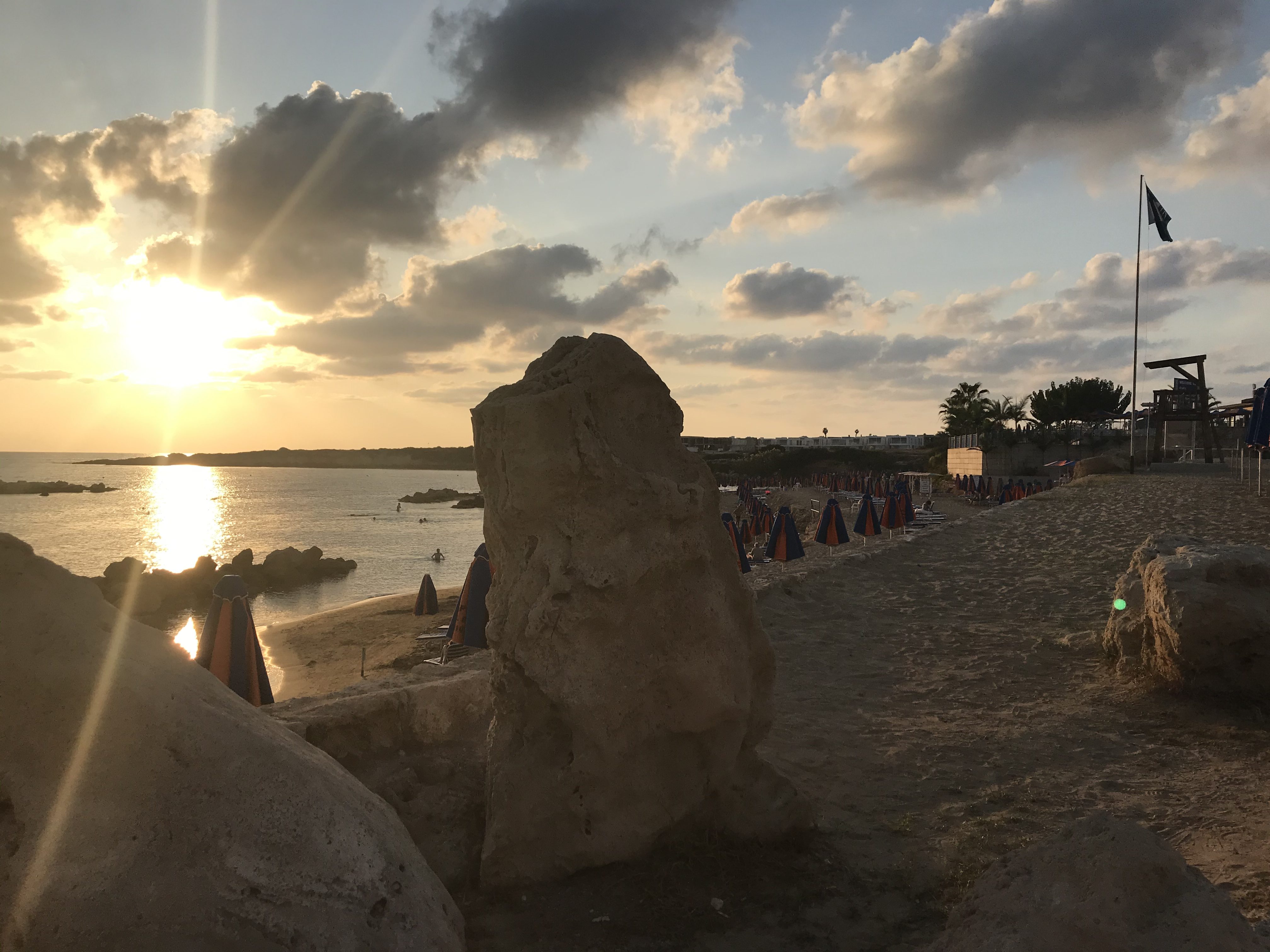 Sun setting at Coralia beach